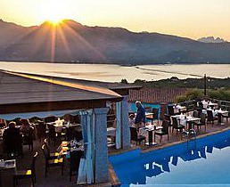 restaurant over looking the porto rotondo bay at sunset