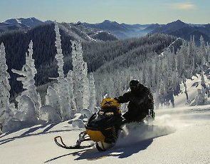 snowmobile adventures in big white, british columbia, canada