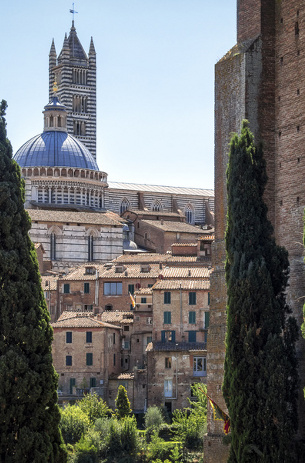 sunset on the tuscan hills of siena