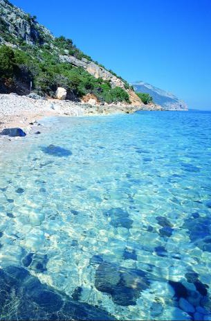 crystal clear waters around villasimius, south sardinia